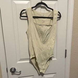 Elegant Cream Ribbed Bodysuit